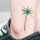 Что означает татуировка пальма на руке